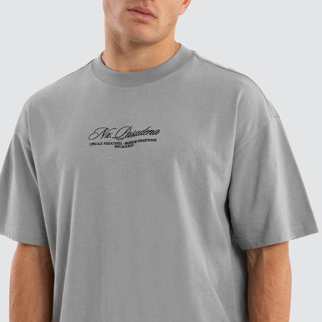 Model wears Upscale Raptor Tee Pigment Ultimate Grey T-Shirts in Grey - Image 3