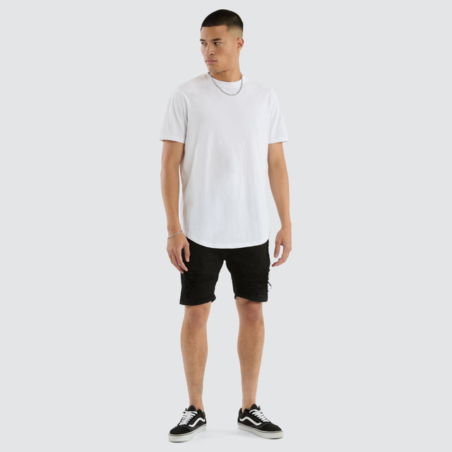 Model wears Spitfire Denim Shorts Jet Black Shorts in Black - Image 2