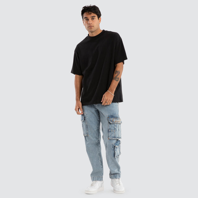 Model Wears Colby Denim Cargo Pant Herring Blue Pants in Blue - Image 2