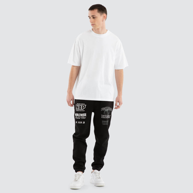 Model Wears Forge Gym Trackpant Jet Black Trackpants in Black - Image 2