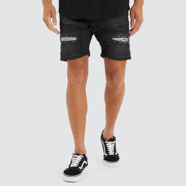 Model Wears Viper Denim Short Heavy Metal Shorts in Black - Image 1