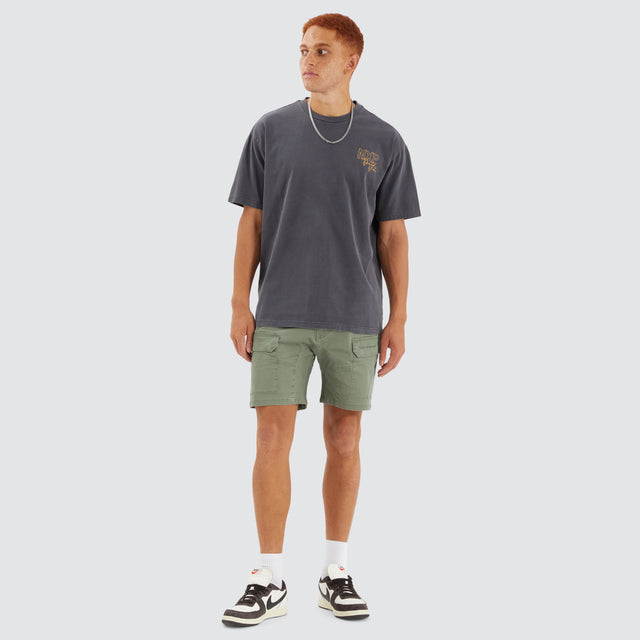 Model Wears F100 Fine Twill Short Khaki Shorts in Green - Image 2