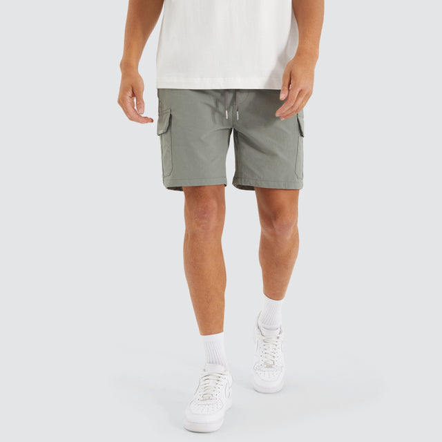 Model Wears S150 Slim Stretch Cargo Short Slate Grey Shorts in Grey - Image 1