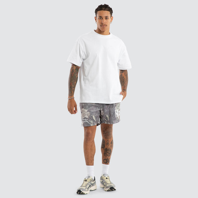 Model wears Carved Camo Mesh Trackshort Camo Shorts in Camo - Image 2