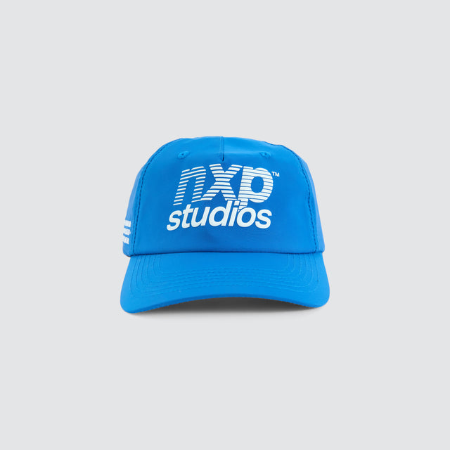 Model Wears Rein Golfer Cap Blue Caps in Blue - Image 1