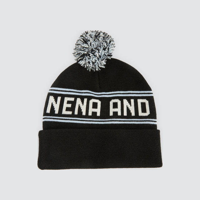 Model Wears Alpha Beanie Jet Black Headwear in Black - Image 1