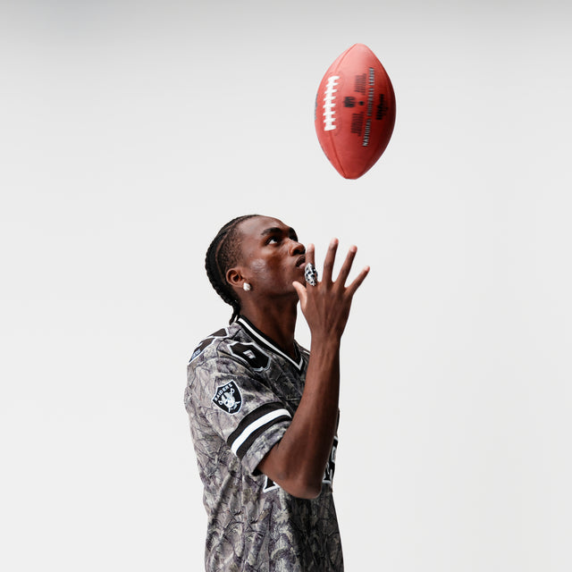 Model Wears Las Vegas Raiders Backfield Jersey Camo Jerseys in Camo - Image 2