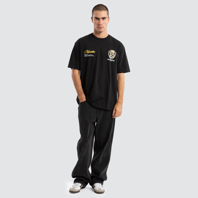 Model Wears Richmond Tigers AFL Season Tee Jet Black T-Shirts in Black - Image 3