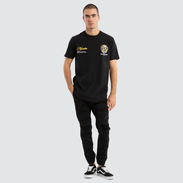 Model Wears Richmond Tigers AFL Prime Tee Jet Black T-Shirts in Black - Image 3