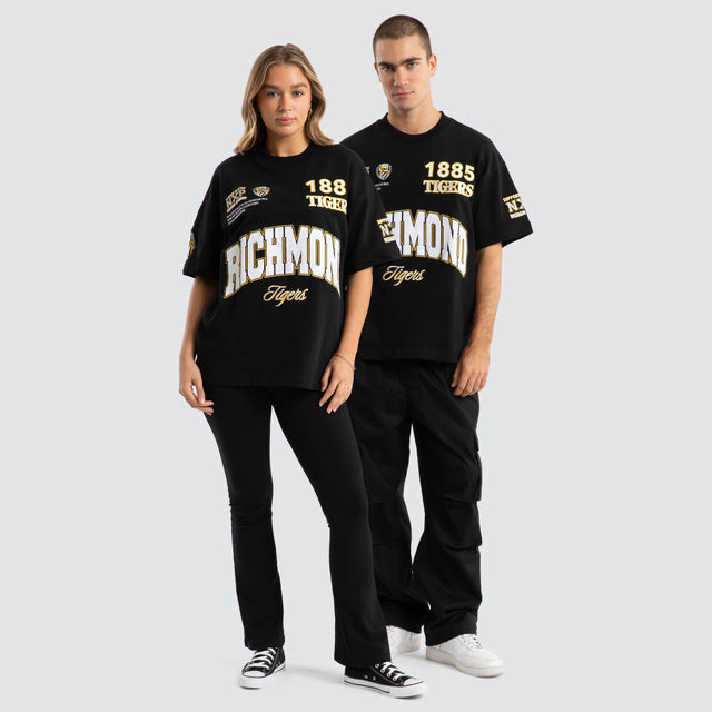 Model Wears Richmond Tigers AFL Academy Tee Jet Black T-Shirts in Black - Image 2