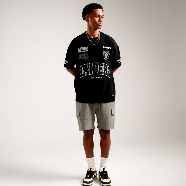 Model Wears Las Vegas Raiders NFL Loopback Raptor Tee Jet Black T-Shirts in Black - Image 2