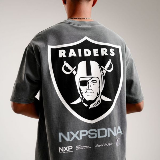Model Wears Las Vegas Box Fit Tee  Pigment Charcoal T-Shirts in Grey - Image 2