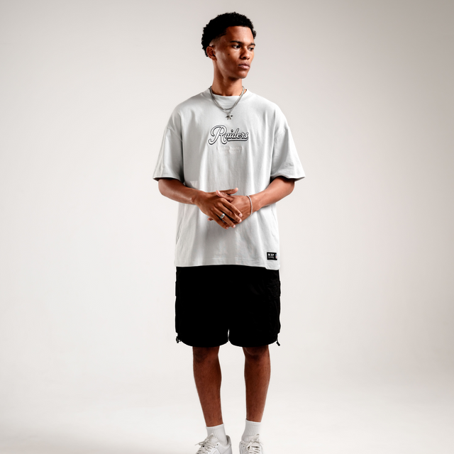 Model Wears Las Vegas Raiders NFL Raptor Tee Silver T-Shirts in Grey - Image 2