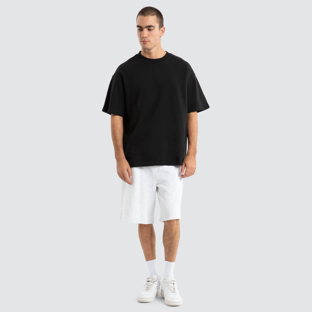 Model Wears Supply Loopback Raptor Tee Jet Black T-Shirts in Black - Image 2