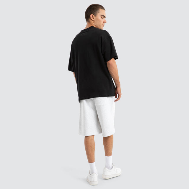 Model Wears Supply Loopback Raptor Tee Jet Black T-Shirts in Black - Image 5