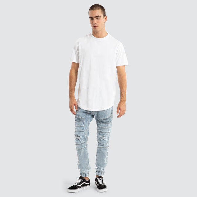 Model Wears Viper Denim Jogger Portland Blue Pants in Blue - Image 2