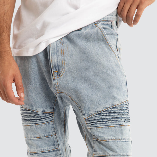 Model Wears Viper Denim Jogger Portland Blue Pants in Blue - Image 5