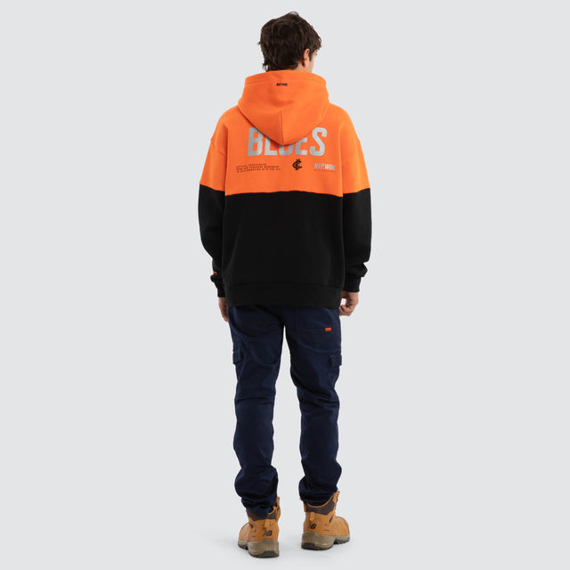 Model wears Carlton Blues Block Hoodie Orange Black Hoodies in Orange - Image 5