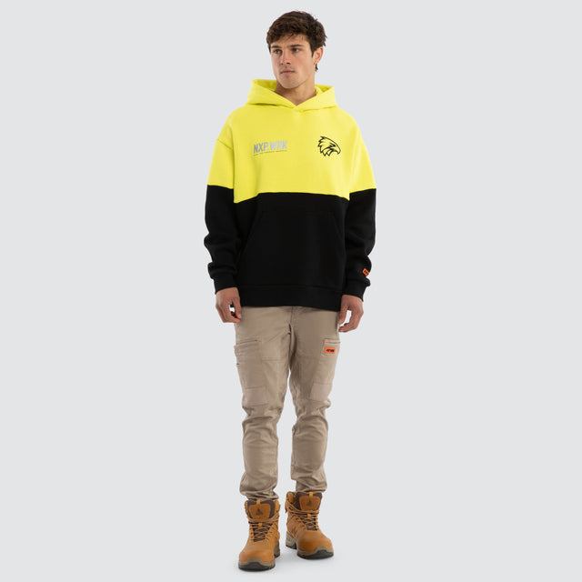 Model wears West Coast Eagles Block Hoodie Yellow Black Hoodies in Yellow - Image 3
