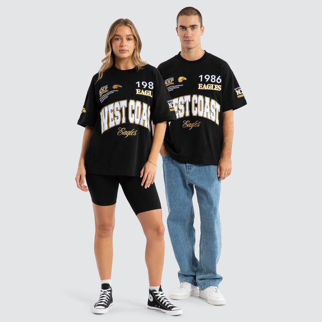 Model Wears West Coast Eagles AFL Academy Tee Jet Black T-Shirts in Black - Image 2