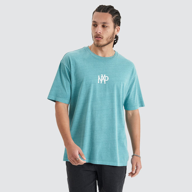 Model Wears Academy Heavy Box Fit Tee Pigment Teal T-Shirts in Teal - Image 3