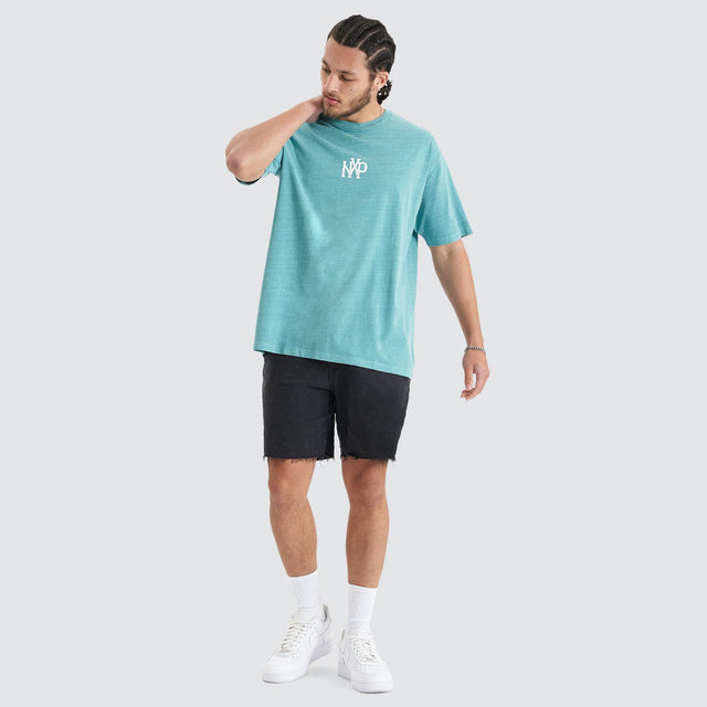 Model Wears Academy Heavy Box Fit Tee Pigment Teal T-Shirts in Teal - Image 4