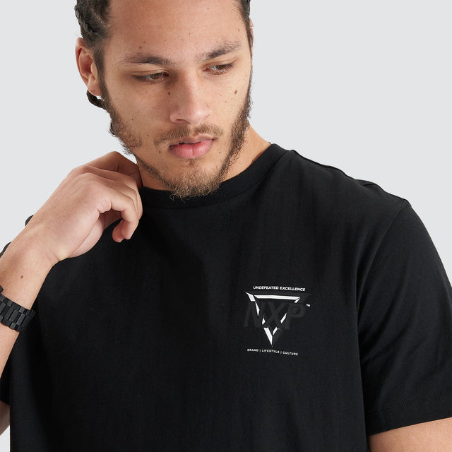 Model Wears Alliance Dual Curved Tee Jet Black T-Shirts in Black - Image 2