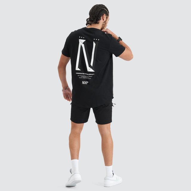 Model Wears Alliance Dual Curved Tee Jet Black T-Shirts in Black - Image 5