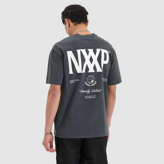 Model Wears Arctic Heavy Box Fit Tee Pigment Asphalt T-Shirts in Grey - Image 1