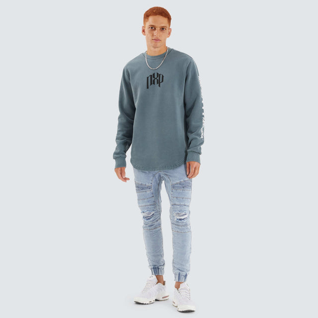 Model Wears Axis Dual Curved Sweater Pigment Stormy Weather Jumpers in Grey - Image 5