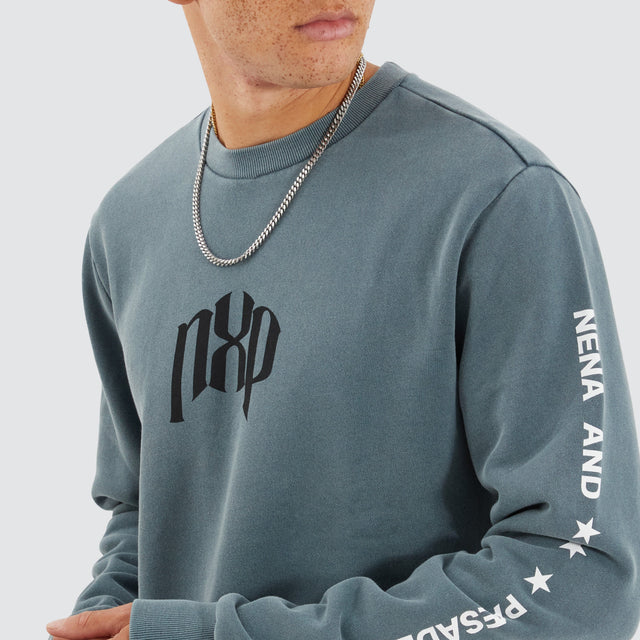 Model Wears Axis Dual Curved Sweater Pigment Stormy Weather Jumpers in Grey - Image 2