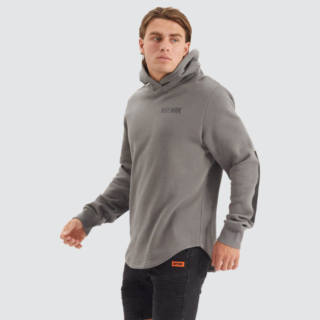 Model Wears Blueprint Dual Curved Hoodie Charcoal Hoodies in Grey - Image 1