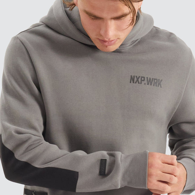 Model Wears Blueprint Dual Curved Hoodie Charcoal Hoodies in Grey - Image 2