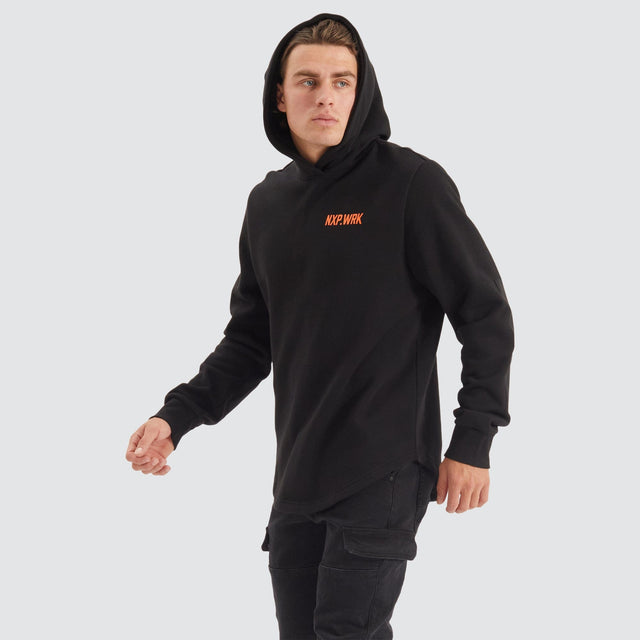 Model Wears Blueprint Dual Curved Hoodie Solid Black Hoodies in Black - Image 2