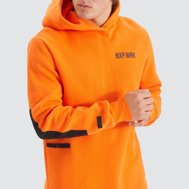 Model Wears Blueprint Dual Curved Hoodie Work Orange Hoodies in Orange - Image 6