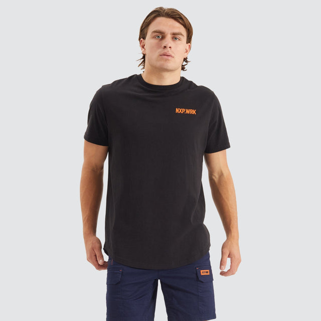 Model Wears Blueprint Dual Curved T-Shirt Solid Black T-Shirts in Black - Image 1