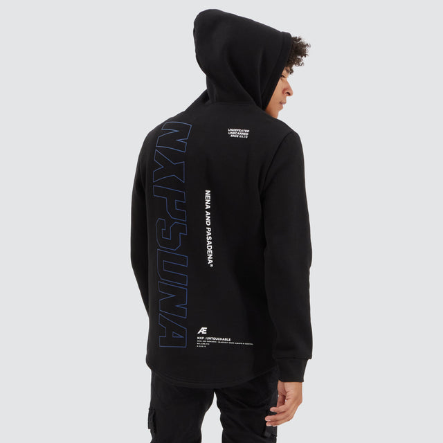 Model Wears Brodder Dual Curved Hoodie Jet Black Hoodies in Black - Image 2