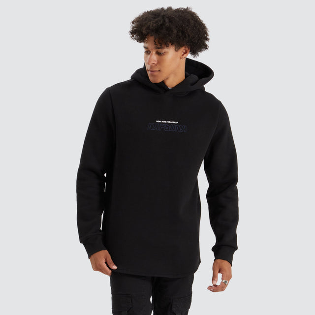 Model Wears Brodder Dual Curved Hoodie Jet Black Hoodies in Black - Image 1