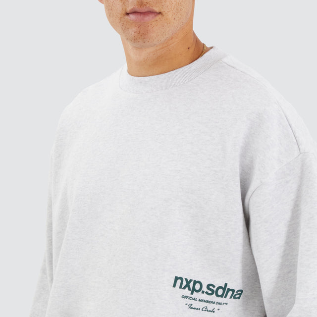 Model Wears Cardinal Box Fit Sweater Snow Marle Jumpers in White - Image 3