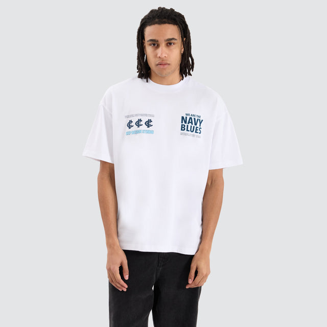 Model Wears Carlton Blues AFL Heavy Raptor Tee Optical White T-Shirts in White - Image 2