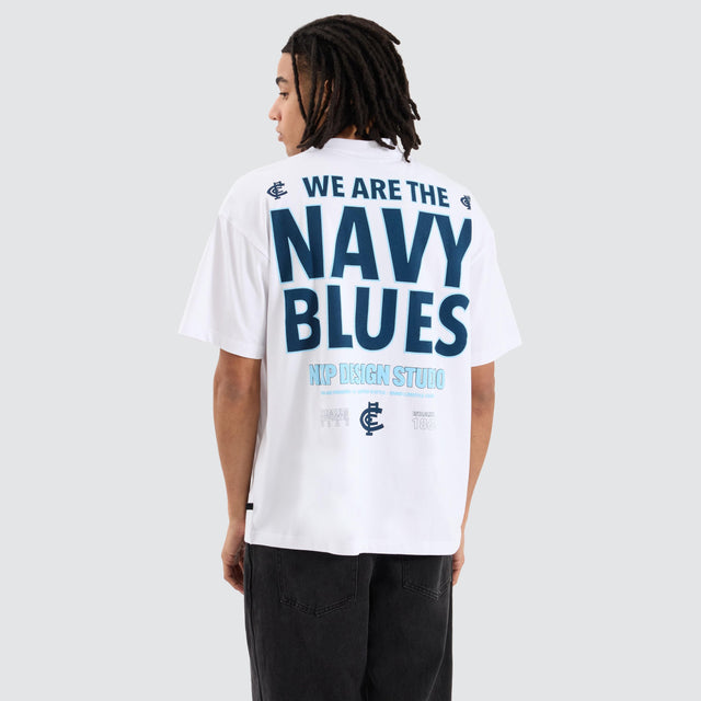 Model Wears Carlton Blues AFL Heavy Raptor Tee Optical White T-Shirts in White - Image 1