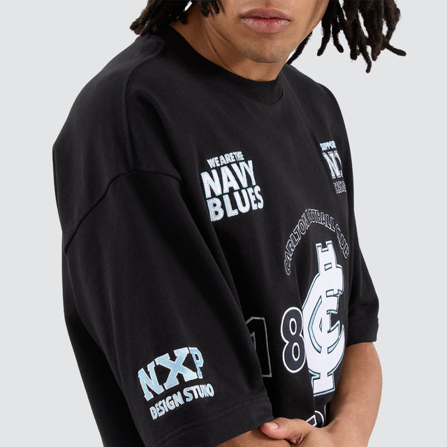 Model Wears Carlton Blues AFL Mega Loopback Tee Jet Black T-Shirts in Black - Image 2