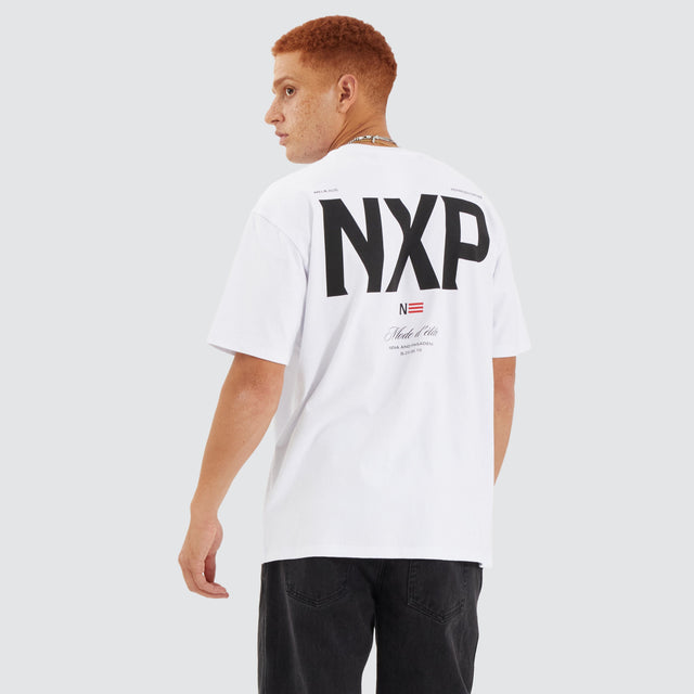 Model Wears Central Box Fit Tee Optical White T-Shirts in White - Image 1