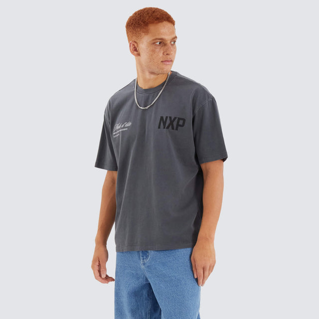 Model Wears Central Box Fit Tee Pigment Asphalt T-Shirts in Grey - Image 5
