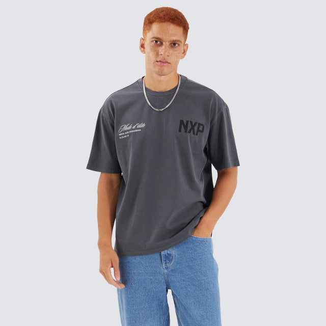Model Wears Central Box Fit Tee Pigment Asphalt T-Shirts in Grey - Image 1