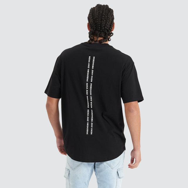 Model Wears Compound Heavy Box Fit Tee Jet Black T-Shirts in Black - Image 2