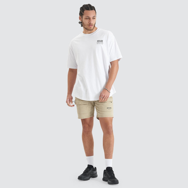 Model Wears Compound Heavy Box Fit Tee Optical White T-Shirts in White - Image 4