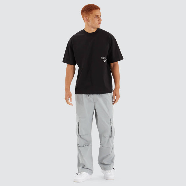 Model Wears Contagent Street Tee Jet Black T-Shirts in Black - Image 4