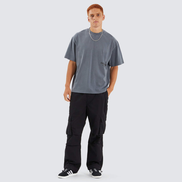 Model Wears Contagent Street Tee Pigment Charcoal T-Shirts in Grey - Image 4