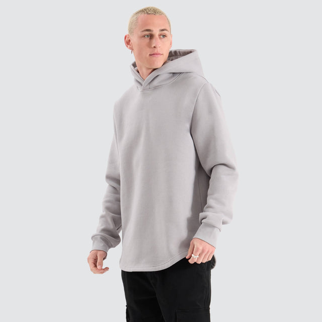 Model Wears Conway Dual Curved Hoodie Alloy Jumpers in Grey - Image 1